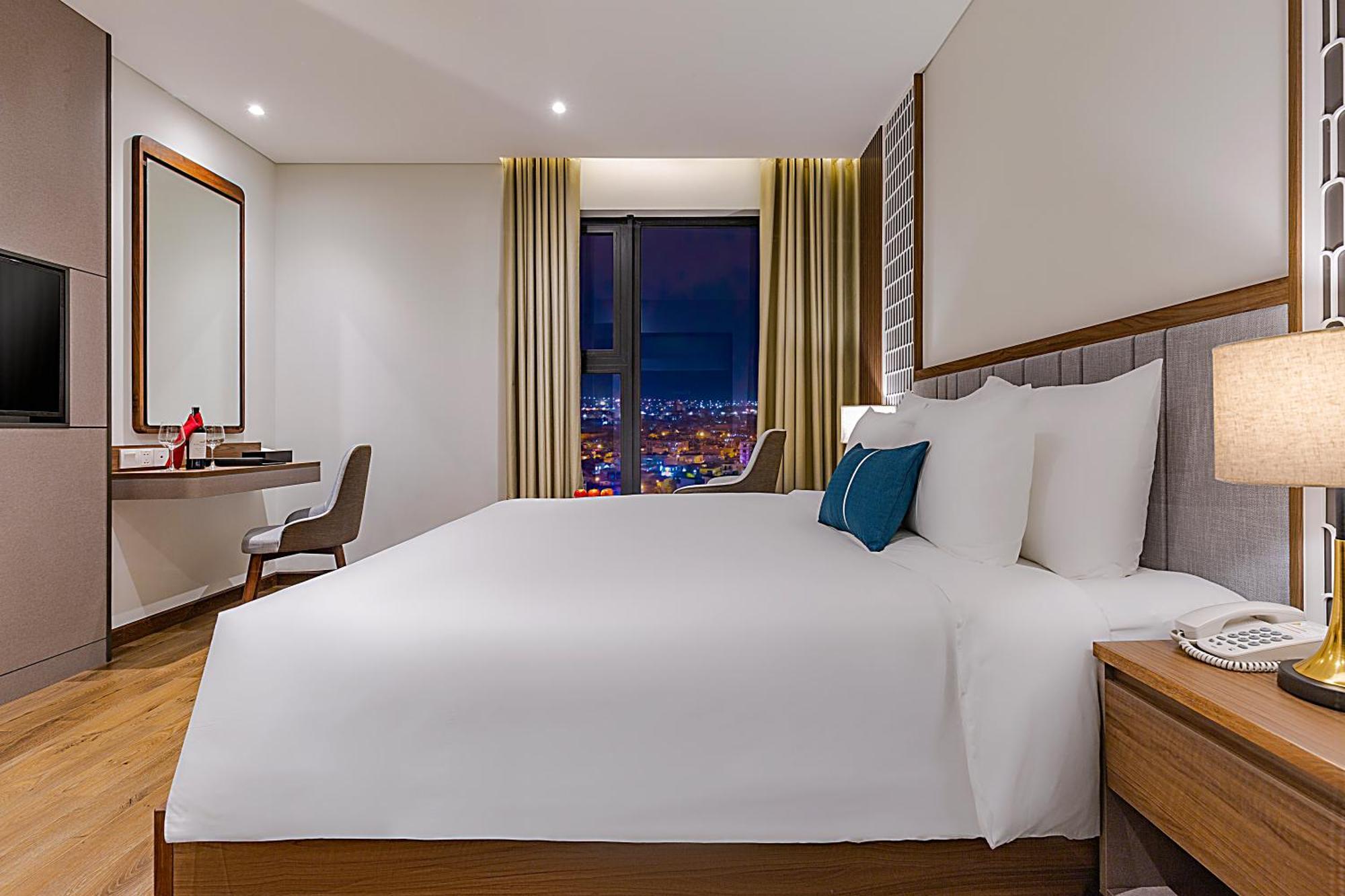 Peninsula Hotel Danang Habitación foto